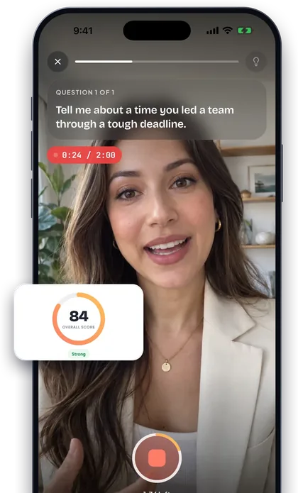 The Huru app on a phone: answering one question on camera, 0:24 of 2:00, with a score card of 84, Strong